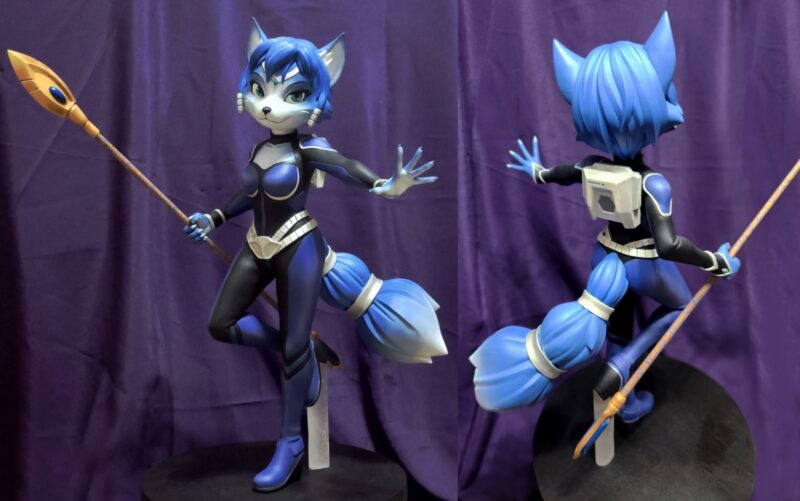 Two angles of the finished, painted figurine.